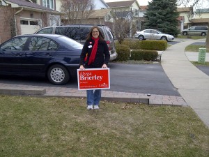 Brierley planting yet another lawn sign.