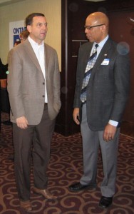 Tim Hudak, Leader of the Progressive Conservative opposition at Queen’s Park chats with Rene Papin before his pep talk to the party faithful at a breakfast meeting.  Papin is one of two declared candidates for the provincial nomination in Burlington.