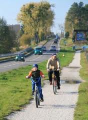 With a protected bike path kept clear year round – residents in the proposed Queensway development would be able to bike to the GO station.  