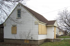Three houses that front on Queensway west of Guelph line wait for the wrecking ball and the creation of a development that will create 58 housing units in a community that has had nothing but small bungalows.