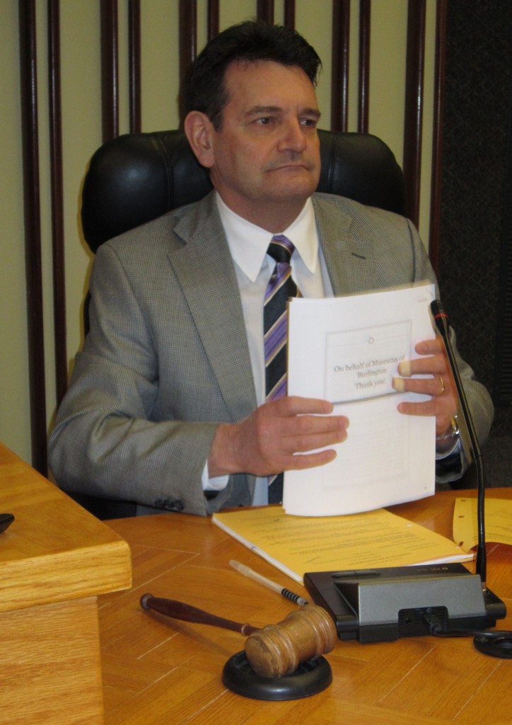 Craven with gavel and papers