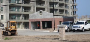Garage entrance exit problems may bring construction of the project to a halt.