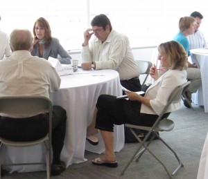 Roman Martiuk, in the white shirt, center, was the kind of city manager who did his home and usually knew more than anyone else in the room about the numbers that lay behind every decision made.