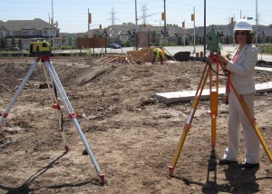 Manager Recreational Services for the city of Burlington, stands in front of the transit being used by engineers as they work on the construction of the skate board rink that is part of the Norton development across the street from the high school, library, community centre complex.  The only thing not on the site (yet?) is a Tim Hortons.