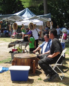 Native drummers entertaining the crowds were asked to stop so the Sophisticated Sound could play popular music.  