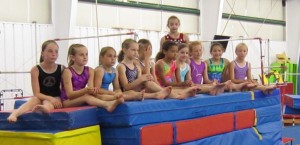 They are like a bunch of little pixies.  They scamper about and then suddenly they are flying through the air coming off a spring board.  They seem to have bottomless energy and somehow stay focused on the athletic routines they do.