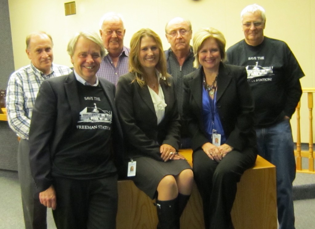 They had every reason to be smiling. Councillors Meed Ward and Lancaster pose with five members of the Friends of Freeman Station after the Council meeting that approved the entering into of a Joint Venture that would have the Friends moving the station and taking on the task of renovating the building.