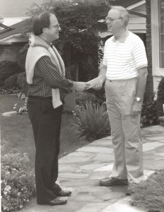 Taylor in full campaign mode greeting a voter.