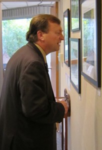 Close up - Burlington's MP Mike Wallace looks closely at a piece of art at the Art Centre. Can BurlingtonGreen convince him to help them take a closer look at the state of the pipeline that runs across the northern part of the city - it is a federal issue.