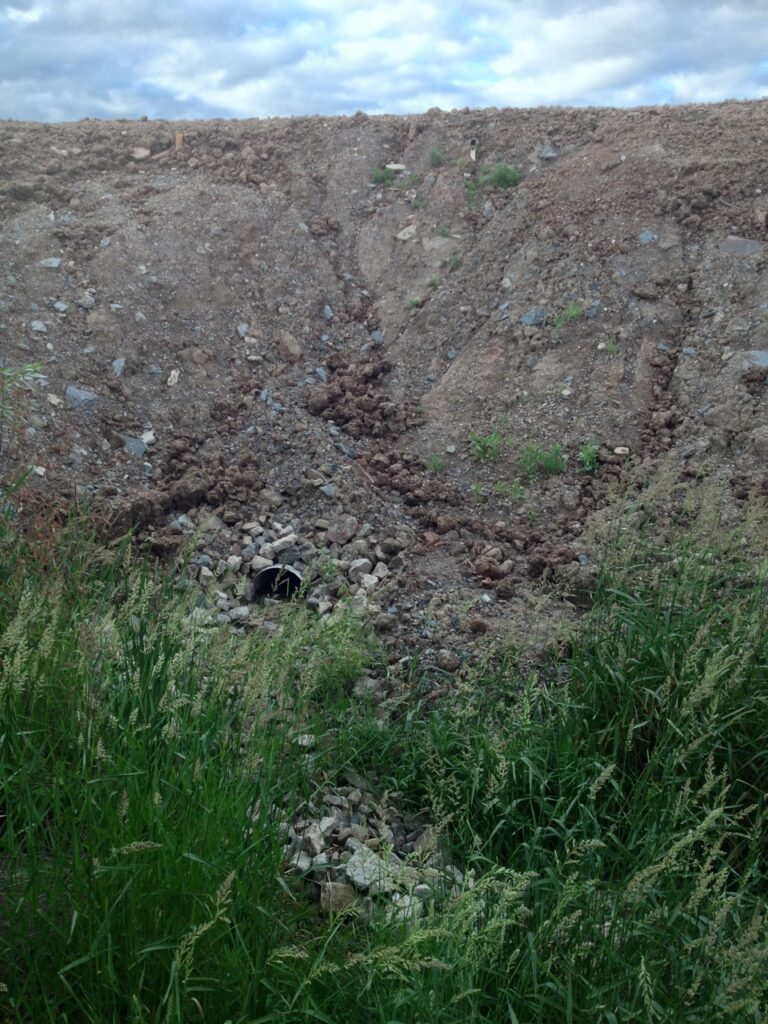 Cousins - north corner 1 showing culvert with stones