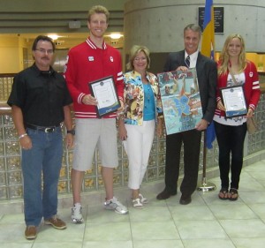 Miss Photo Op - never misses a camera opportunity - but then so do most of the otrher Council members.  Councillor Blair LAncaster in the center with Burlington Olympians 