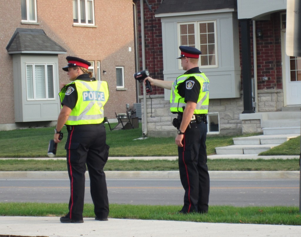 Police with radasr guns at Alton two officers