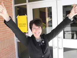 McKenna arms up outside polling