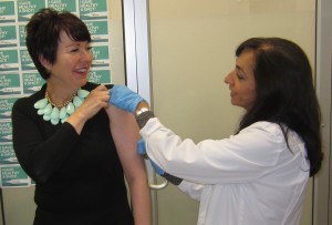 Burlington MPP Jane McKenna gets her annual flu shot from Anita Sahu at the Rexall Pharmacy on Guelph Line.