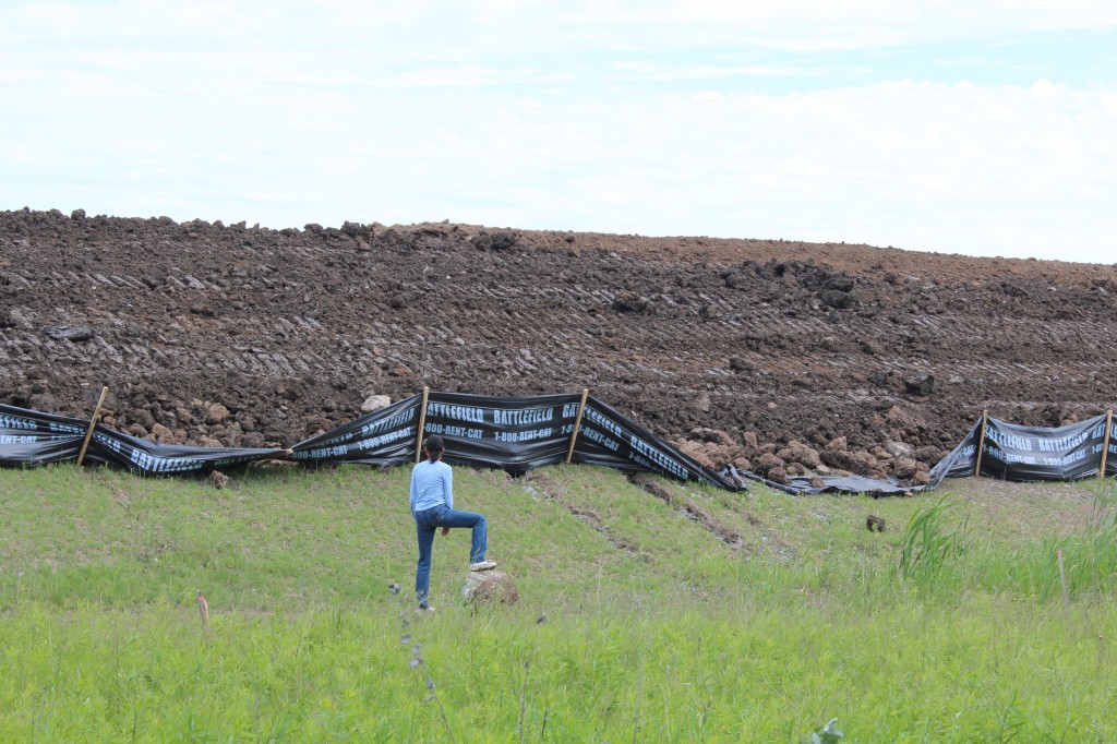 This Appleby Lline resident wonders if the Court decision will mean this pile of earth will be hauled away. Or does the decision mean she has a claim against someone for the damage done to the value of her property/