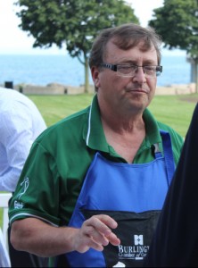 Burlington MP Mike Wallace - flipping burgers at a Chamber of Commerce event.