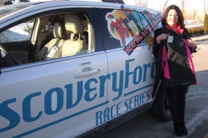 Arnot standing with Discovery Ford