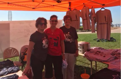 Mai in the merch tent