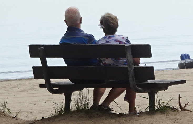 seniors looking over lake Beachway