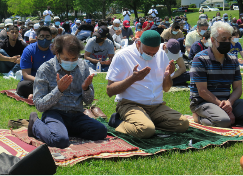 Muslims participating in Call to Prayer