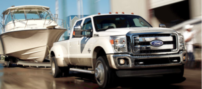 truck towing boat