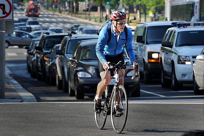 SLUG: ph-cyclists DATE: April 15, 2010 NEG NUMBER: 213218 LOCATION: Constitution Avenue, NW at New Jersey and 6th streets intersections. PHOTOGRAPHER: GERALD MARTINEAU, for TWP CAPTION: We photograph morning rush hour bicycle commuters amidst traffic on Constitution Avenue, NW. Photo shot at Constutution Ave, NW. and 6th Street. StaffPhoto imported to Merlin on Thu Apr 15 11:19:04 2010