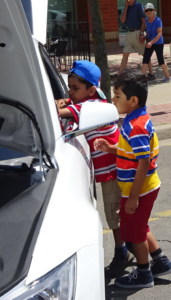 Car show - boys looking