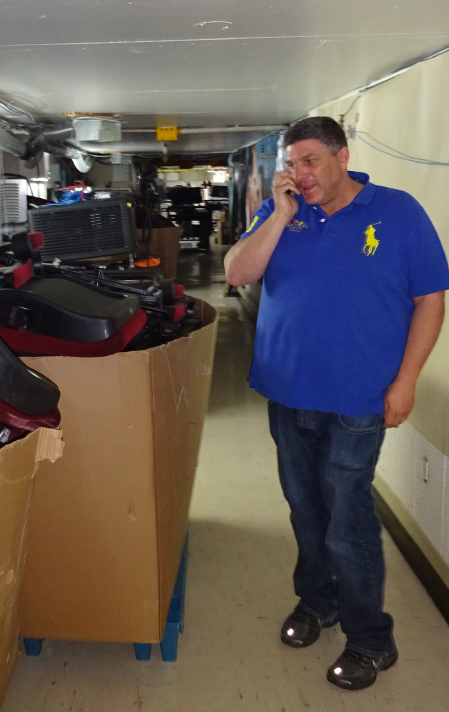 Cinestarz Bruce Gerburg in projector room with chairs