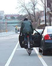 Cycling driver dooring a cyclist