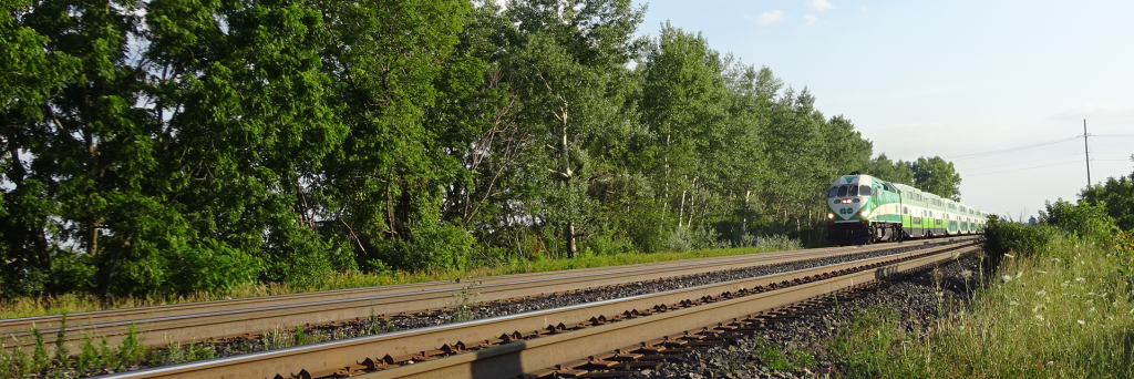 GO train approaching Sheldon Creek bridge