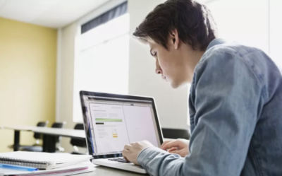 HS student at computer