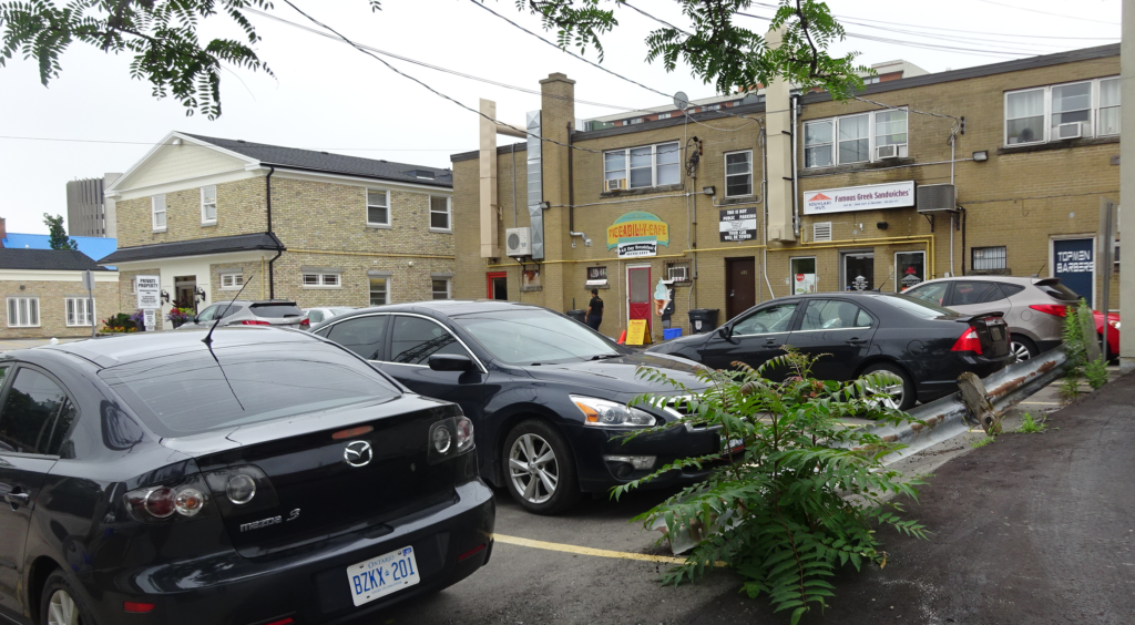 John - parkling and revenue property south of Caroline west side