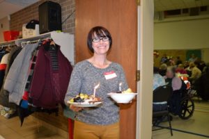 Pic 3 - lady holding food