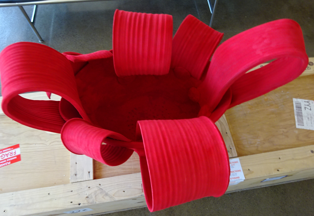 Reid - red clay on shipping crate