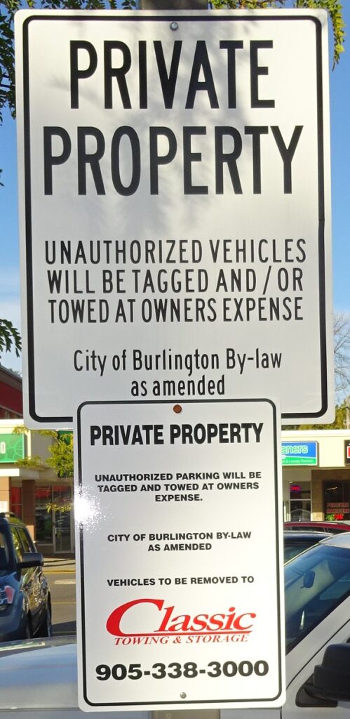 Tow signs in No Frills