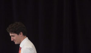 Canadian Prime Minister Justin Trudeau leaves the stage following a discussion on women's leadership, Thursday, November 24, 2016 in Monrovia, Liberia. THE CANADIAN PRESS/Adrian Wyld