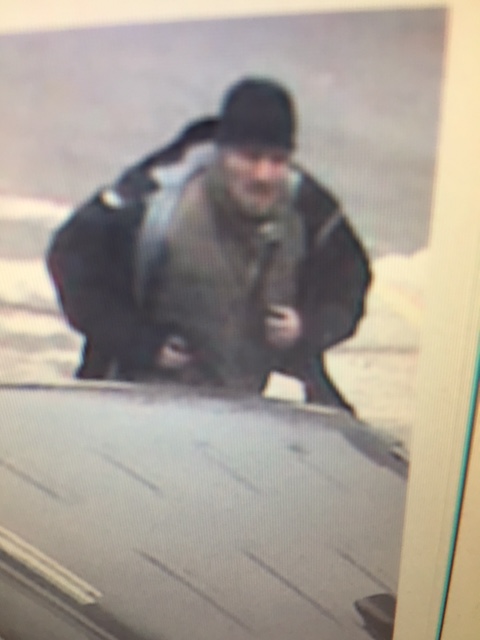 gas station car theft suspect